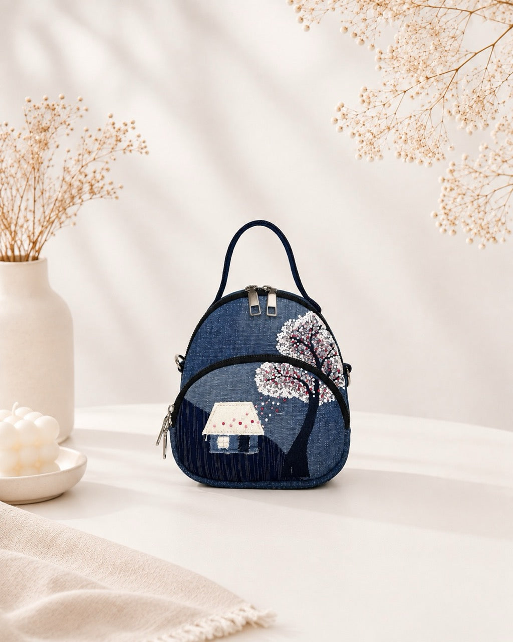 Blossom cottage mini bag made from upcycled denim with hand-embroidery details