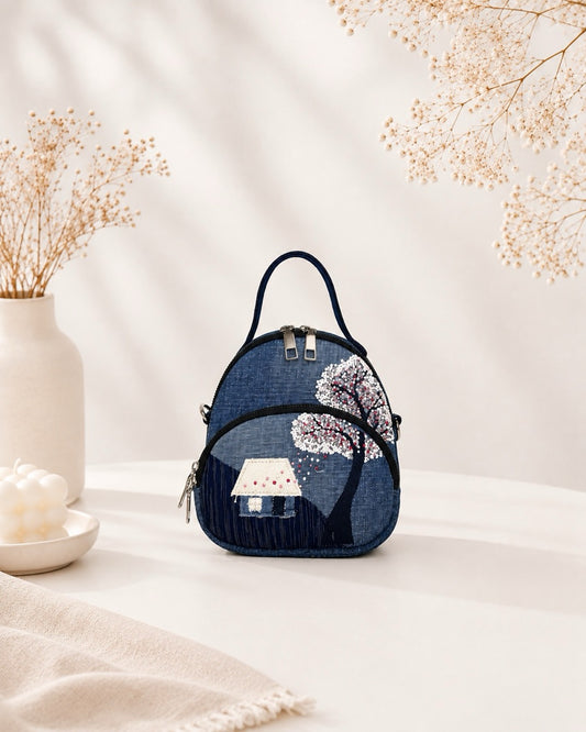 Blossom cottage mini bag made from upcycled denim with hand-embroidery details