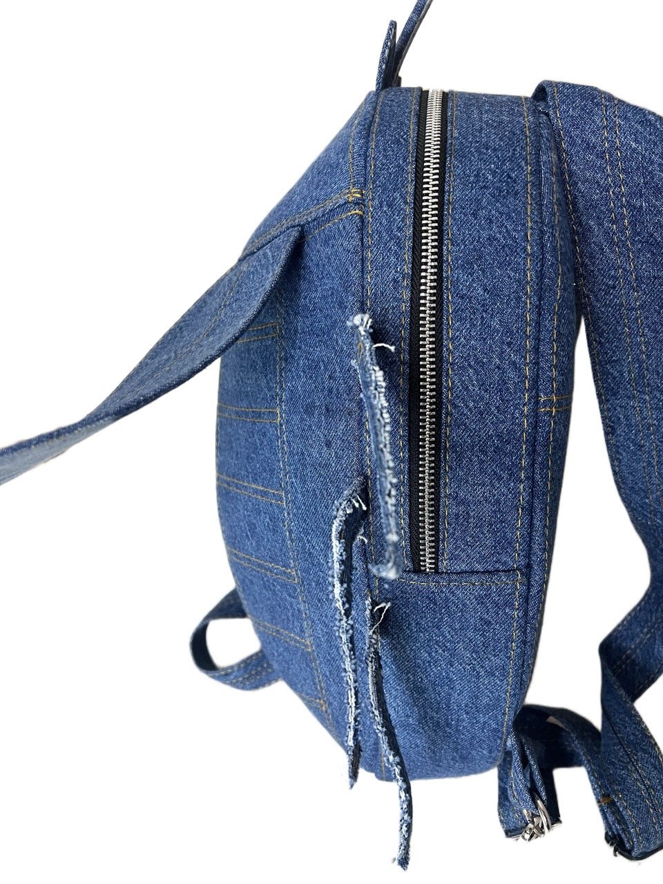 One-of-a-kind upcycled denim backpack sculpted into the shape of a cicada