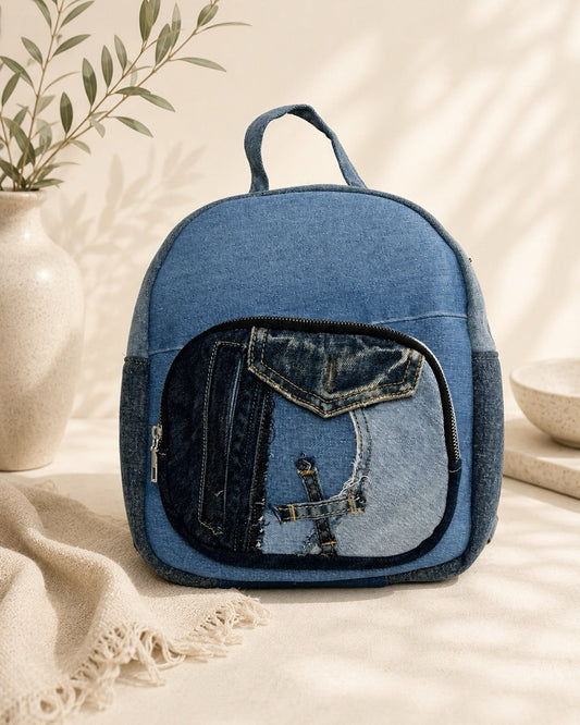 Unique denim backpack with a one-of-a-kind patchwork front pocket- available in Cuty NZ