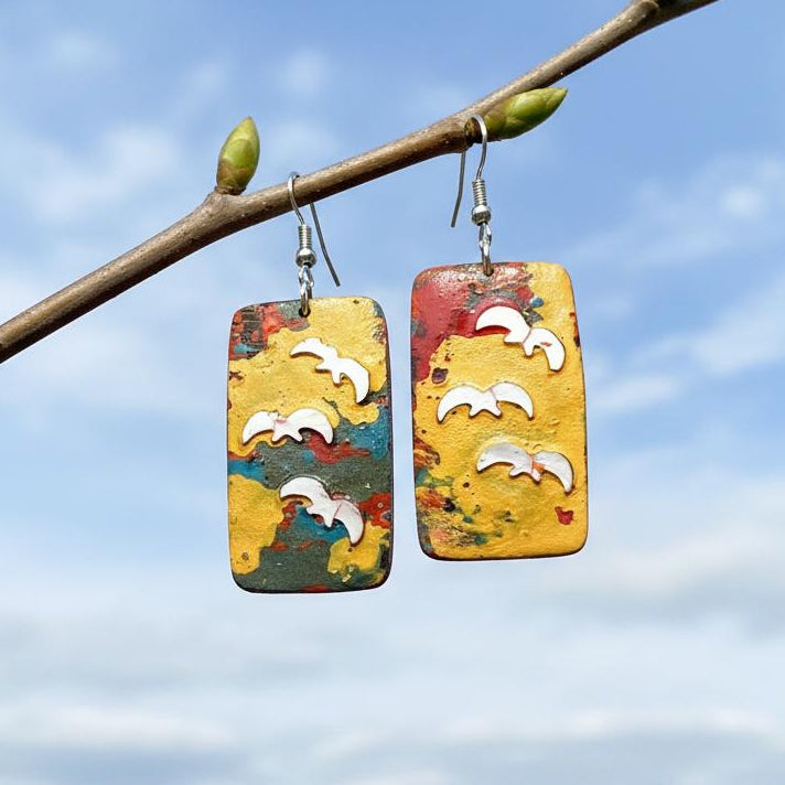 Unique handcrafted lacquer earrings made from coconut shell and seashell. Available online in NZ