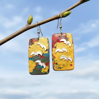 Unique handcrafted lacquer earrings made from coconut shell and seashell. Available online in NZ
