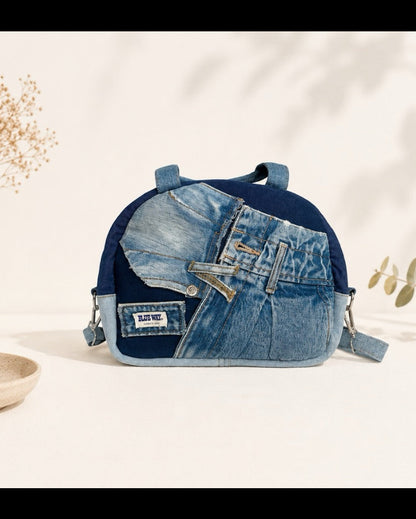 Unique dome bag made from preloved denim. Features with long adjustable strap allows to wear as handbag or crossbody bag