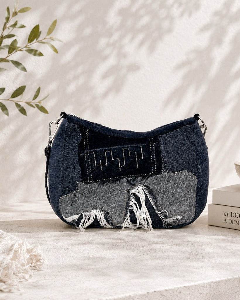 Unique bag made from upcycled denim in black. Available online at Cuty