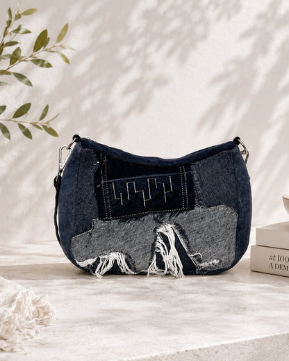 Unique bag made from upcycled denim in black. Available online at Cuty