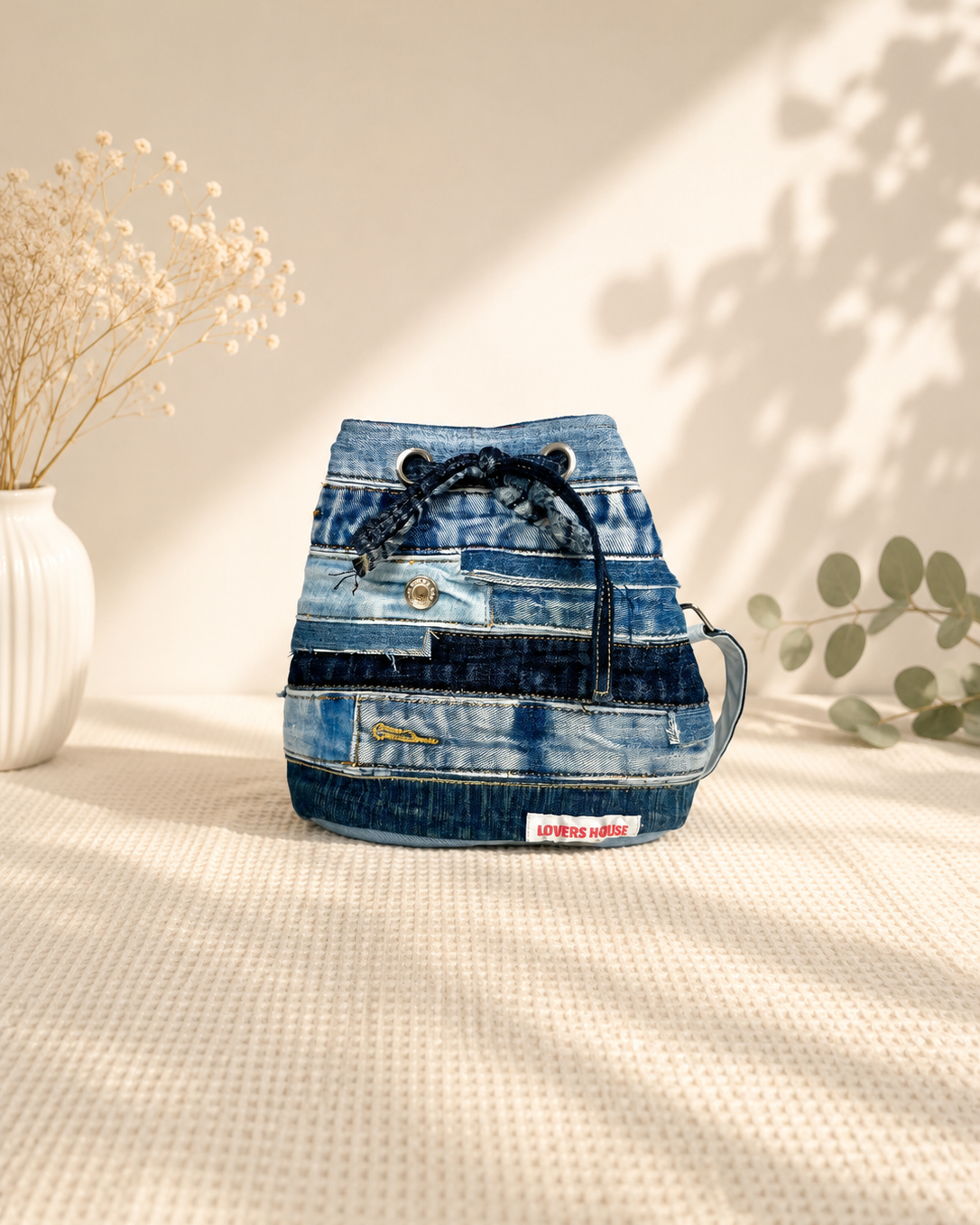 Bucket bag made from preloved denim with 2 strap, 1 short strap and 1 long adjustable allows to wear as shoulder bag or crossbody bag