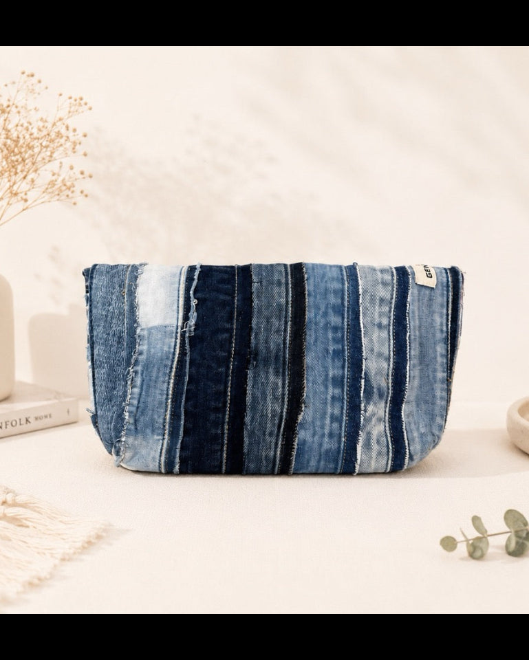 Handcrafted bag made from preloved denim features three ways to wear, as a pouch, a handbag, or a crossbody bag