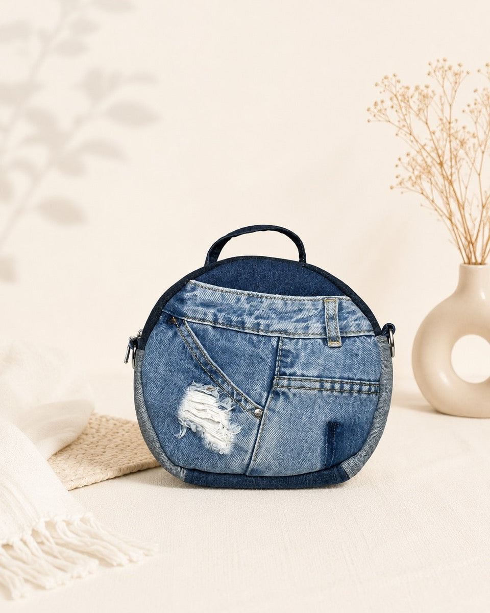 Handcrafted round handbag with adjustable strap allows to wear as handbag or crossbody bag. Available online at Cuty NZ